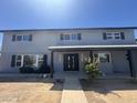 Charming two-story home with a covered entryway and freshly painted exterior at 925 W Fairway Dr, Mesa, AZ 85201