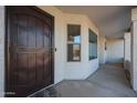 Front entry with a metal security door and sidelights at 1025 E Kerry Ln, Phoenix, AZ 85024