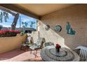 Relaxing patio with seating area, perfect for outdoor enjoyment at 14300 W Bell Rd # 502, Surprise, AZ 85374