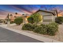 House exterior showcasing a well-maintained front yard and landscaping at 14861 W Verde Ln, Goodyear, AZ 85395