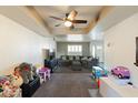 Living area with plush seating and view to entryway at 1865 W Keating Ave, Mesa, AZ 85202