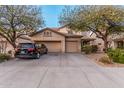 Charming two-story home with a three-car garage and well-maintained landscaping at 19308 W Jefferson St, Buckeye, AZ 85326