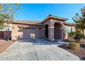 Well-maintained house with a two-car garage and front yard at 3134 E Sunrise Pl, Chandler, AZ 85286