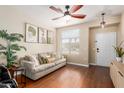 Bright living room with hardwood floors and comfy seating at 3640 W Melinda Ln, Glendale, AZ 85308