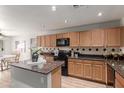 Modern kitchen with granite counters and ample cabinetry at 3645 E Sheffield Rd, Gilbert, AZ 85296