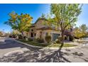 View of a two-story townhome from the side, showcasing its architectural details and landscaping at 5133 N 34Th Pl, Phoenix, AZ 85018