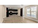 Modern dark kitchen with stainless steel appliances at 1983 E Don Carlos Ave, Tempe, AZ 85281