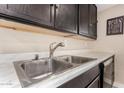 Clean kitchen sink with stainless steel double basin and modern faucet at 1983 E Don Carlos Ave, Tempe, AZ 85281