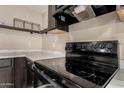 Modern black electric stove top in contemporary kitchen setting at 1983 E Don Carlos Ave, Tempe, AZ 85281