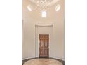 Spacious living room with fireplace and tile floors at 22318 N 36Th St, Phoenix, AZ 85050