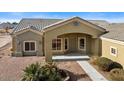 Front view of a house with a covered entryway and walkway at 24508 S 194Th St, Queen Creek, AZ 85142