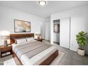 Spacious bedroom with wood bed frame and ample closet space at 40551 N Jodi Dr, San Tan Valley, AZ 85140