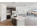 Open-concept living room with sliding glass doors, connecting indoor and outdoor spaces at 4342 E Enmark Dr, San Tan Valley, AZ 85143