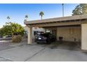 Covered carport with space for one car and additional storage at 633 S 77Th St, Mesa, AZ 85208