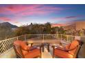 Relaxing patio with seating area and mountain views at 10102 E Saddle Horn Trl, Scottsdale, AZ 85255