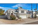 Charming two-story home with a well-manicured yard and a two-car garage at 1179 N Granada Dr, Chandler, AZ 85226