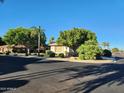 House exterior view, showcasing landscaping and curb appeal at 17790 N 66Th Ln, Glendale, AZ 85308