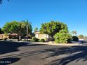 House exterior view, showcasing landscaping and curb appeal at 17790 N 66Th Ln, Glendale, AZ 85308