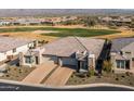 Two-car garage home with a view of the golf course at 29215 N Horton Creek Trl, Rio Verde, AZ 85263