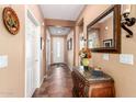 View of entryway with tile floor, console table, and mirror at 42621 W Heavenly Pl, Maricopa, AZ 85138