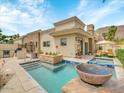 Private pool and spa with patio furniture at 6000 E Camelback Rd # 7707, Scottsdale, AZ 85251