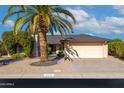 House exterior showcasing a single-story home with a two-car garage and desert landscaping at 814 S 78Th St, Mesa, AZ 85208