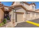 Building exterior showing garage and walkway at 6535 E Superstition Springs Blvd # 124, Mesa, AZ 85206