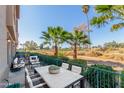 Outdoor patio with seating area and golf course view at 6535 E Superstition Springs Blvd # 124, Mesa, AZ 85206