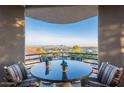 Private patio with mountain views and bistro table at 15302 E Lotus Ln, Fountain Hills, AZ 85268