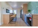 Modern kitchen with stainless steel appliances and hexagon tile at 280 E Morelos St, Chandler, AZ 85225