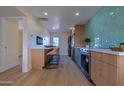 Modern kitchen with stainless steel appliances and hexagon tile at 280 E Morelos St, Chandler, AZ 85225