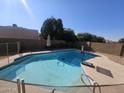 Inviting backyard swimming pool with a basketball hoop at 5421 W Brown St, Glendale, AZ 85302