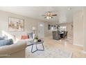 Open living and dining area with a neutral color palette at 6201 W Maryland Ave, Glendale, AZ 85301