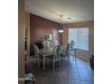 Formal dining room featuring a large table and six chairs at 7417 W Park St, Laveen, AZ 85339