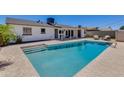 Refreshing pool surrounded by a spacious patio perfect for entertaining at 8024 E Hubbell St, Scottsdale, AZ 85257