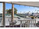 Relaxing patio furniture overlooking a tennis court at 111 S Greenfield Rd # 488, Mesa, AZ 85206