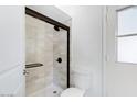 Modern bathroom with a walk-in shower and stylish tile at 1910 E Gemini Dr, Tempe, AZ 85283