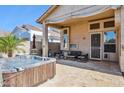 Relaxing backyard oasis with a hot tub, patio seating, and covered area, great for entertaining or unwinding at 31016 N 42Nd Way, Cave Creek, AZ 85331