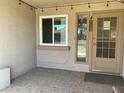 Front entrance with a stained glass sidelight and a welcome mat at 3723 W Helena Dr, Glendale, AZ 85308