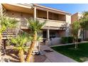 View of the exterior of a two-story apartment building showing stairs leading to a balcony at 5995 N 78Th St # 2030, Scottsdale, AZ 85250