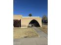 Charming brick home with an arched entryway and walkway at 2146 E Donner Dr, Tempe, AZ 85282