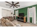 Bright and airy living room with a comfortable seating area at 2427 W Kowalsky Ln, Phoenix, AZ 85041