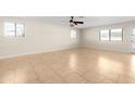 Spacious living room with tile floors and neutral walls at 2715 S Rita Ln, Tempe, AZ 85282