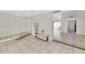 Bright entryway with tiled floors and a view to the living areas at 3536 W Acapulco Ln, Phoenix, AZ 85053