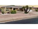 Ranch-style home with desert landscaping and a two-car garage at 4725 E Capri Ave, Mesa, AZ 85206