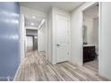 Small half bathroom with dark brown vanity and tile flooring at 10012 E Tamery Ave, Mesa, AZ 85212