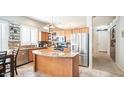 Spacious kitchen featuring an island and stainless steel appliances at 1022 E Hiddenview Dr, Phoenix, AZ 85048
