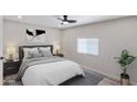Serene bedroom with soft lighting, modern decor, neutral color palette, and comfortable furniture at 104 N 114Th St, Apache Junction, AZ 85120