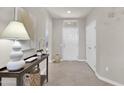 Bright and airy entryway with a console table and modern decor at 18603 N Twilight Way, Surprise, AZ 85374