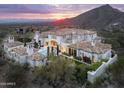 Expansive estate showcasing a large home, pool, and mountain backdrop at 21487 N 110Th Pl, Scottsdale, AZ 85255